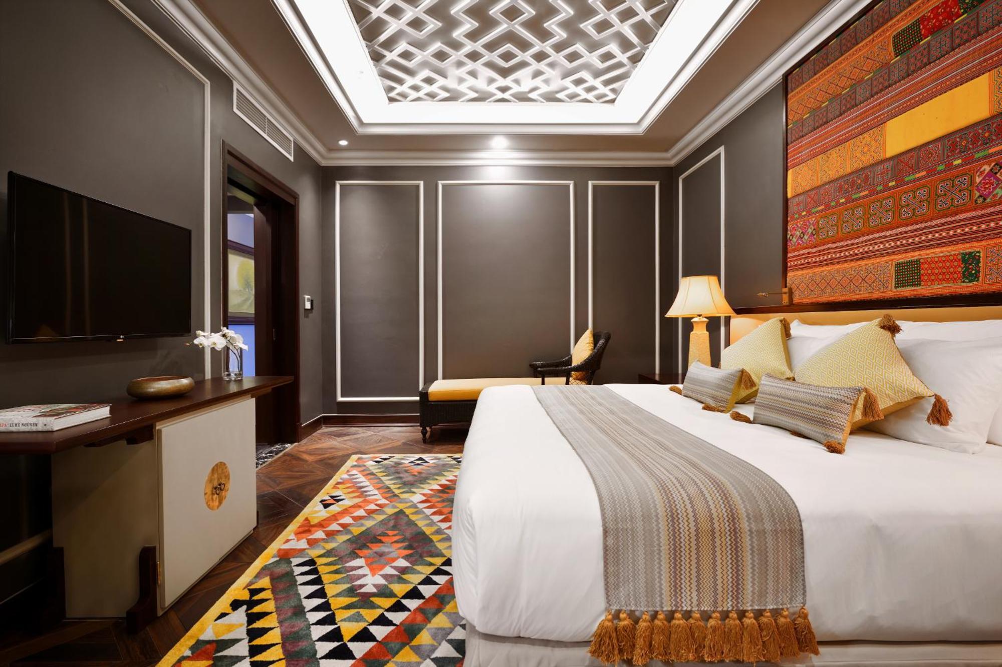 Silk Path Grand Sapa Resort & Spa Exterior foto A bedroom at the hotel